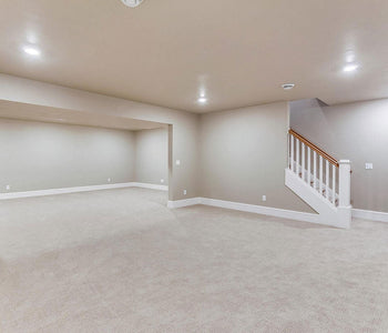 From Cold Concrete to Cozy Living: Choosing the Right Flooring for Your Basement